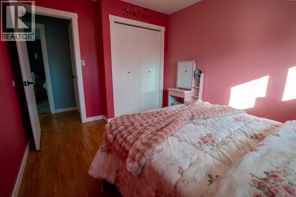 5018 42 Avenue, Taber, AB - Indoor Photo Showing Bedroom