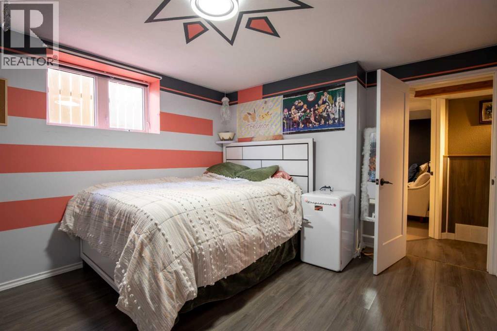 5018 42 Avenue, Taber, AB - Indoor Photo Showing Bedroom