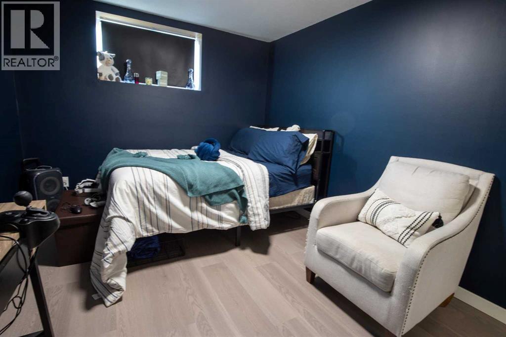 5018 42 Avenue, Taber, AB - Indoor Photo Showing Bedroom