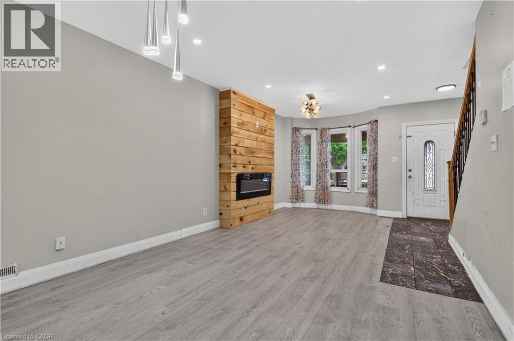 55 Francis Street, Hamilton, ON - Indoor With Fireplace