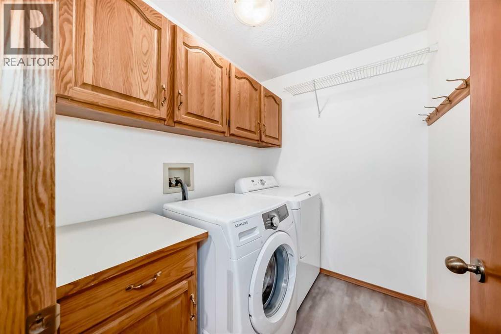 266 Edgepark Way Nw, Calgary, AB - Indoor Photo Showing Laundry Room