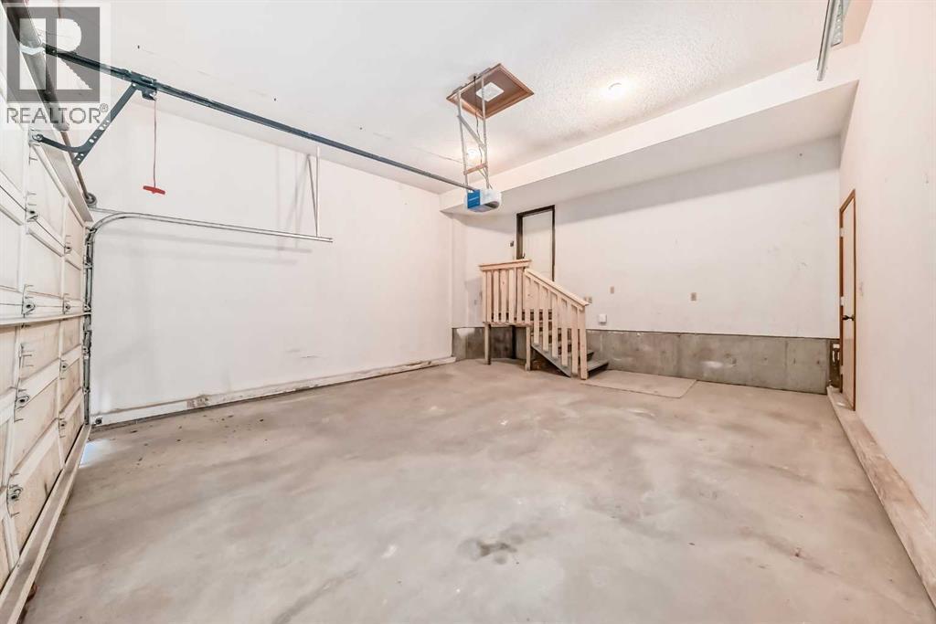 266 Edgepark Way Nw, Calgary, AB - Indoor Photo Showing Garage