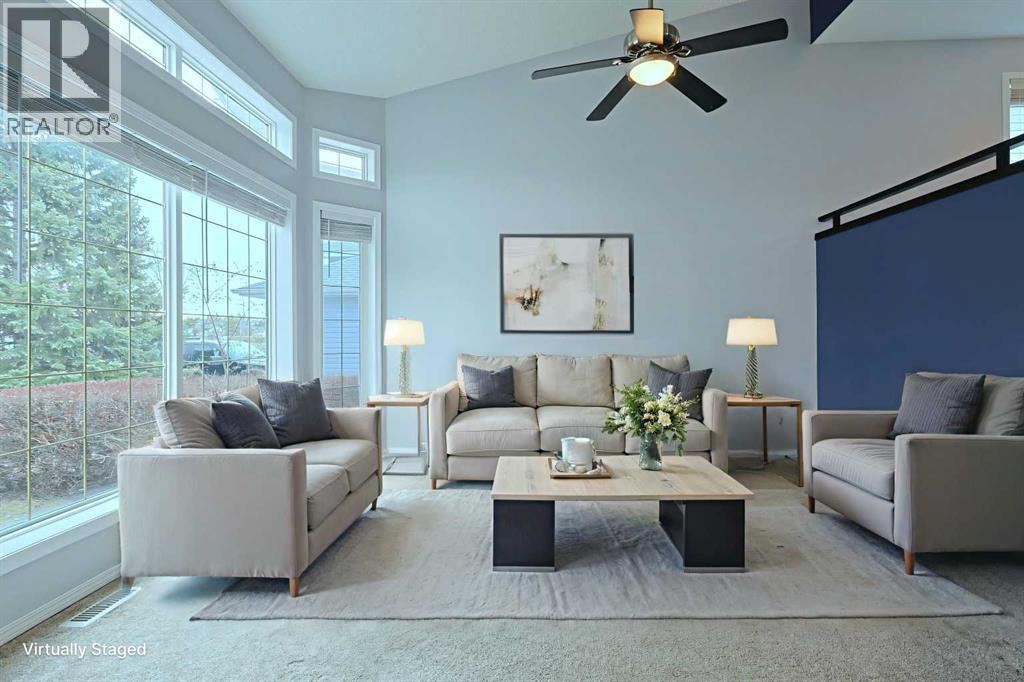 19 Sunridge Crescent Nw, Airdrie, AB - Indoor Photo Showing Living Room