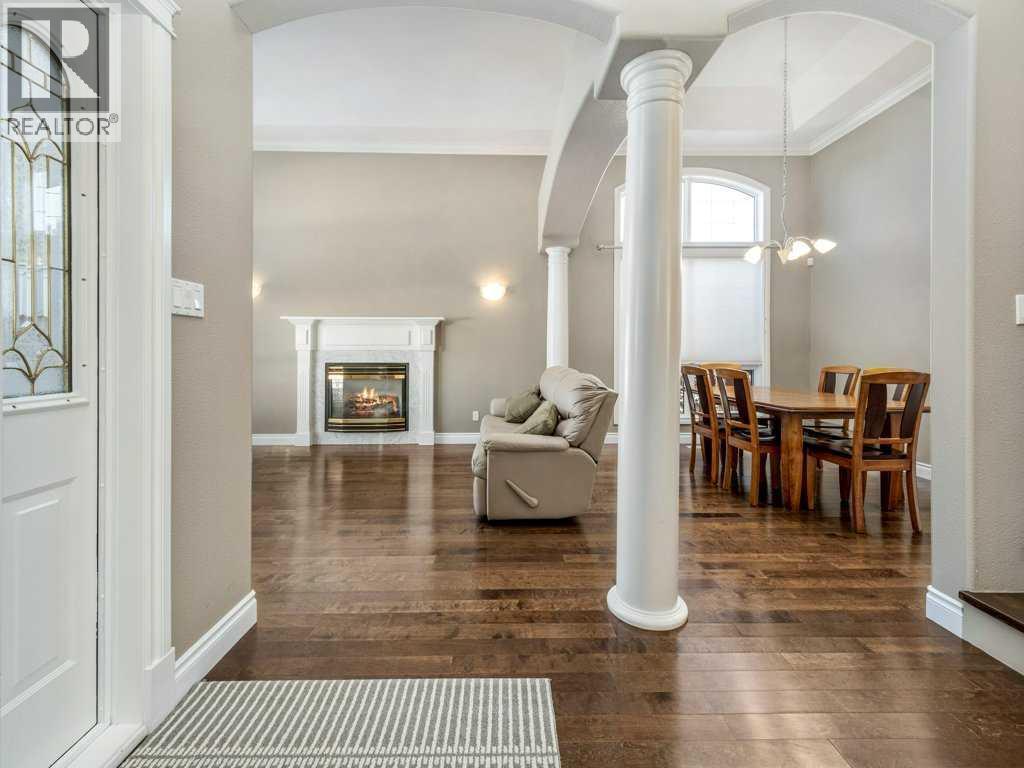 24 Fairmont Point S, Lethbridge, AB - Indoor Photo Showing Other Room With Fireplace