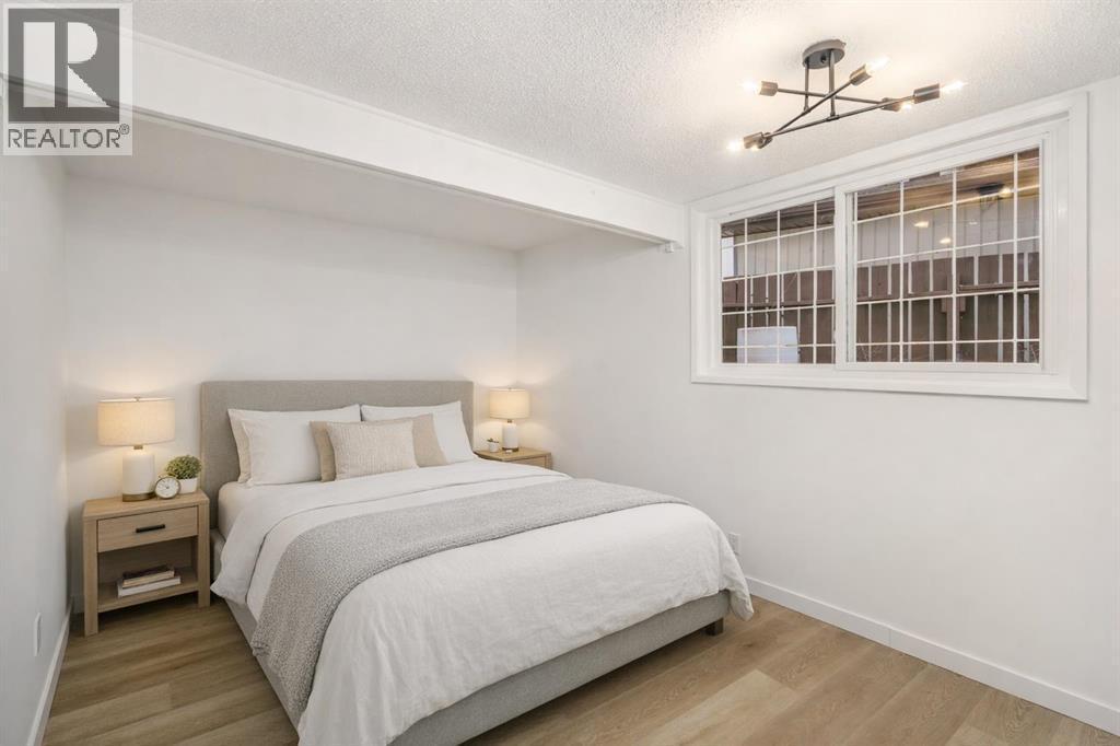 Virtually staged image - 15 A Arlington Bay Se, Calgary, AB - Indoor Photo Showing Bedroom