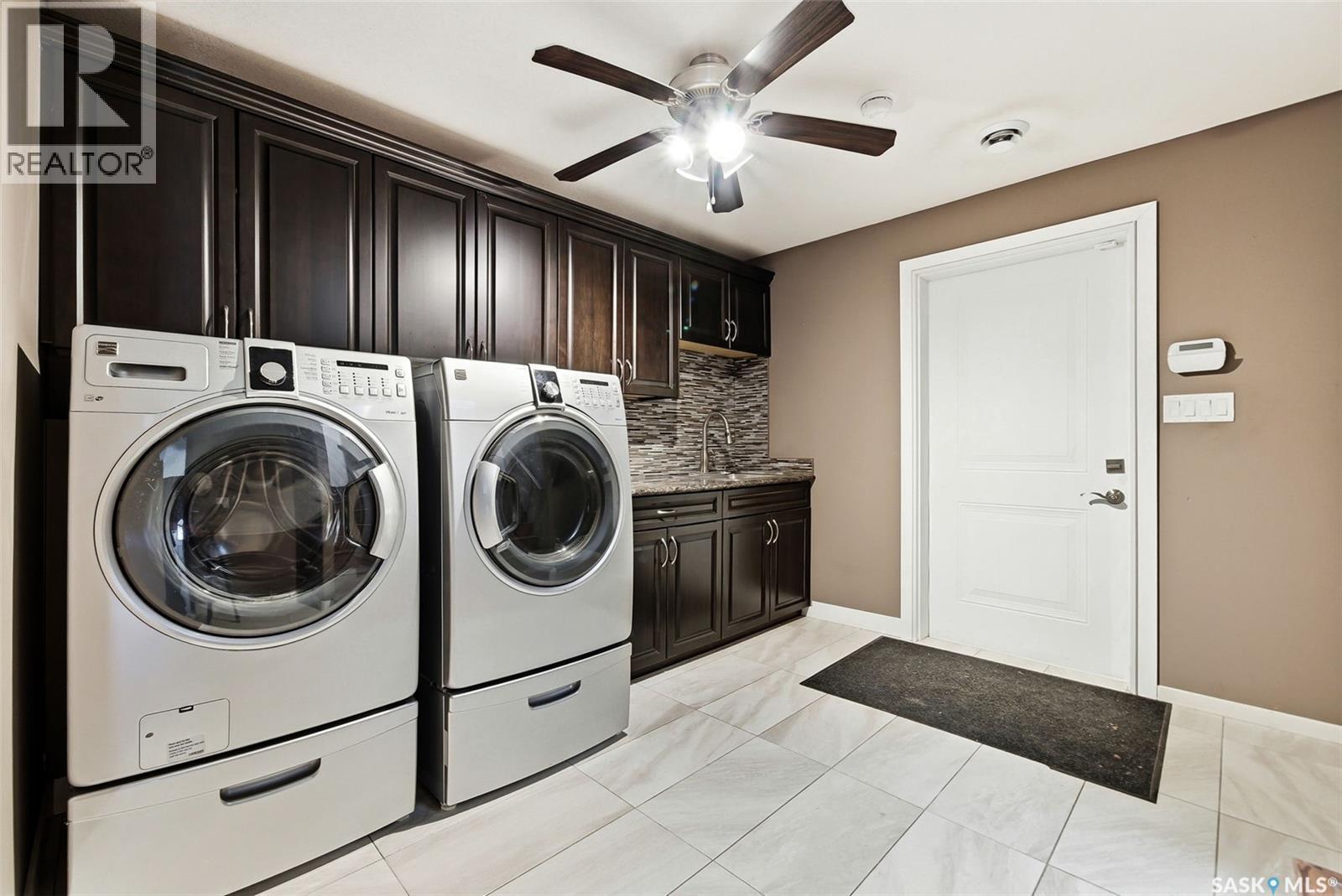 Matt Acreage, Edenwold, SK - Indoor Photo Showing Laundry Room