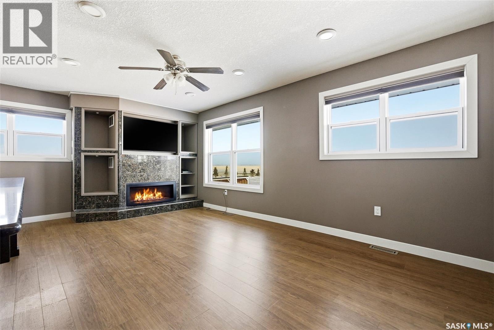 Matt Acreage, Edenwold, SK - Indoor With Fireplace