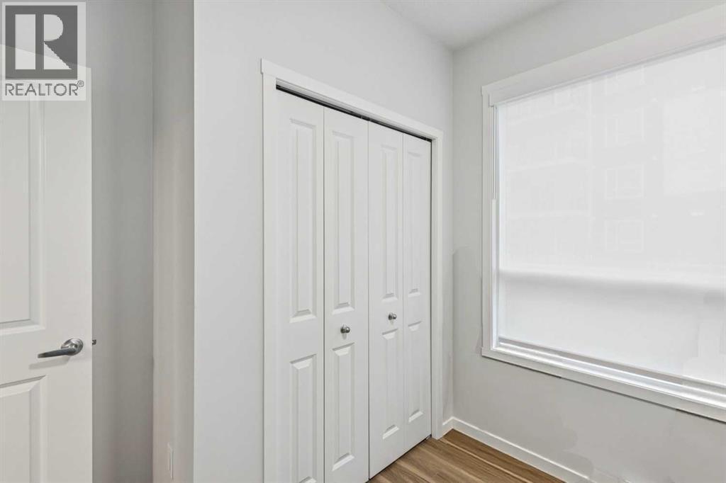 3116, 33 Carringham Gate Nw, Calgary, AB - Indoor Photo Showing Other Room