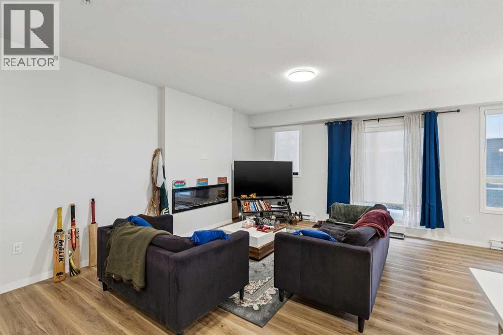 3116, 33 Carringham Gate Nw, Calgary, AB - Indoor Photo Showing Living Room