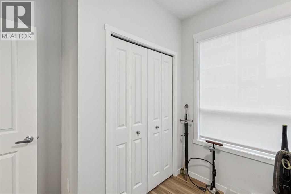 3116, 33 Carringham Gate Nw, Calgary, AB - Indoor Photo Showing Other Room
