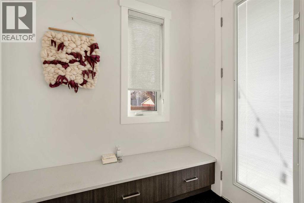 Conveniently Sized Mudroom W/ Closet & Storage Space - 303 30 Avenue Ne, Calgary, AB - Indoor Photo Showing Other Room