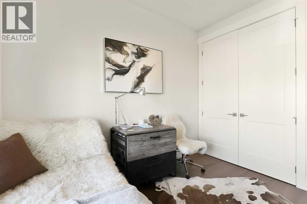 Good Sized Closet W/ Dual Swinging Doors - 303 30 Avenue Ne, Calgary, AB - Indoor Photo Showing Bedroom