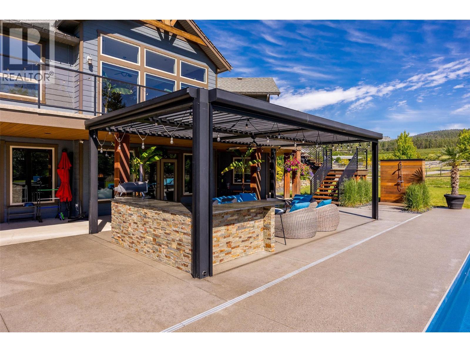 4284 Jaud Road, Kelowna, BC - Outdoor With In Ground Pool