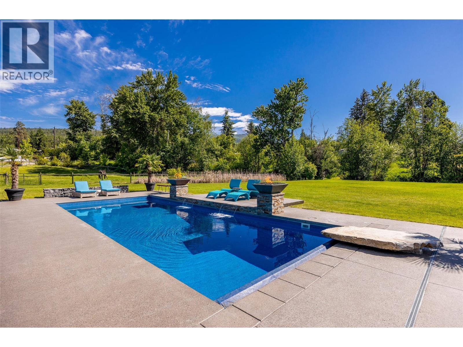 4284 Jaud Road, Kelowna, BC - Outdoor With In Ground Pool