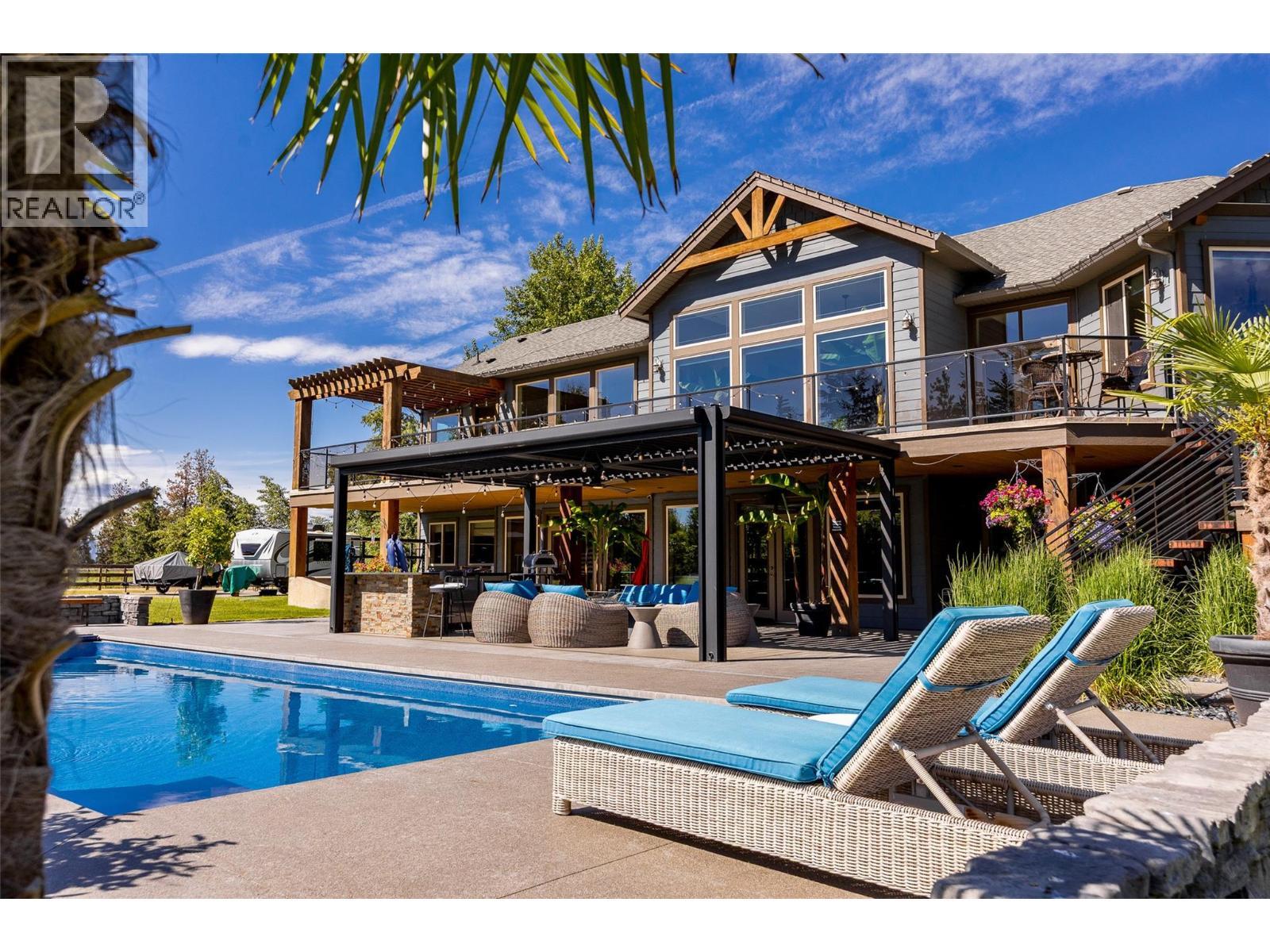 4284 Jaud Road, Kelowna, BC - Outdoor With In Ground Pool