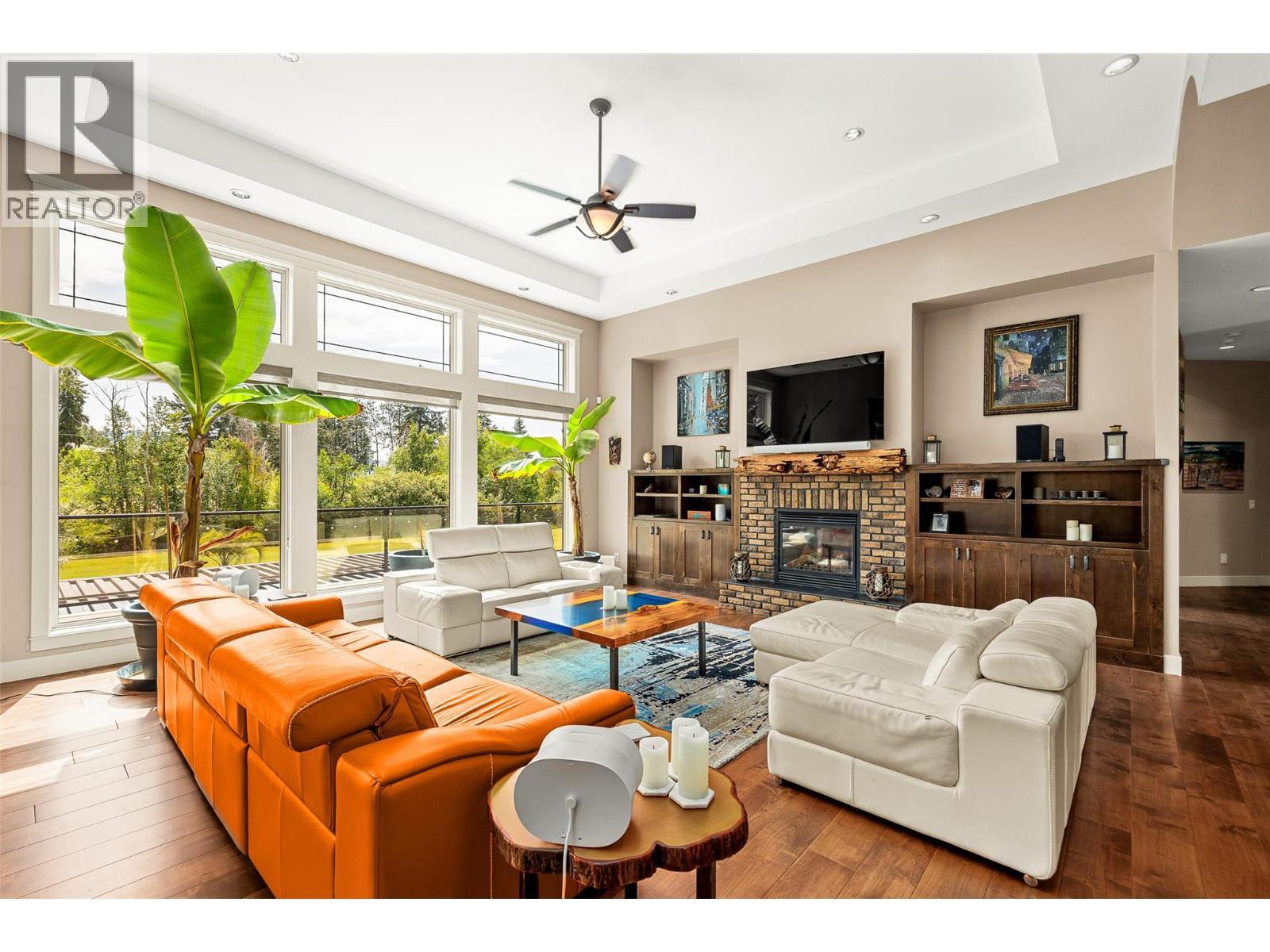 4284 Jaud Road, Kelowna, BC - Indoor Photo Showing Living Room With Fireplace