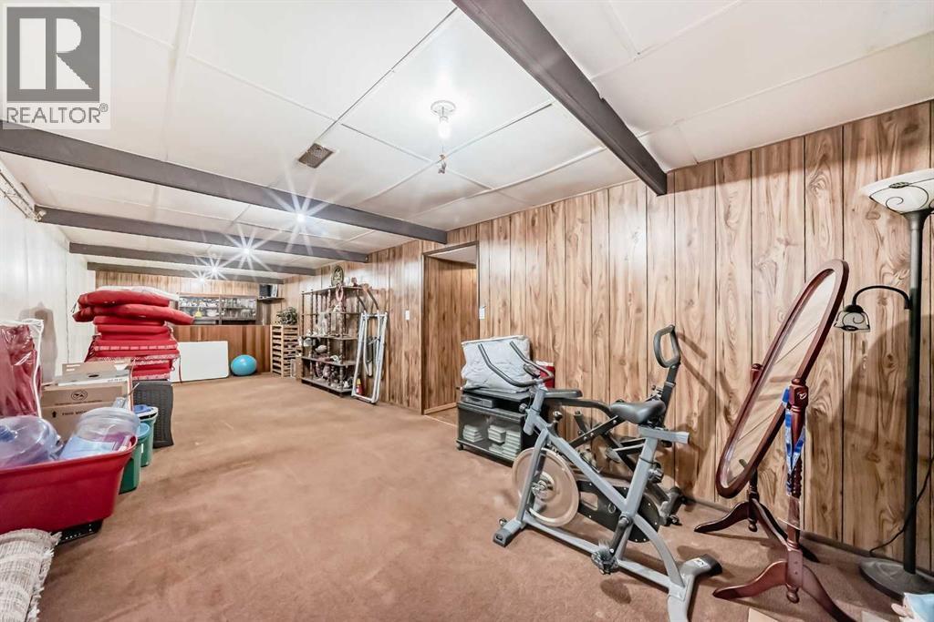 2205 80 Avenue Se, Calgary, AB - Indoor Photo Showing Gym Room