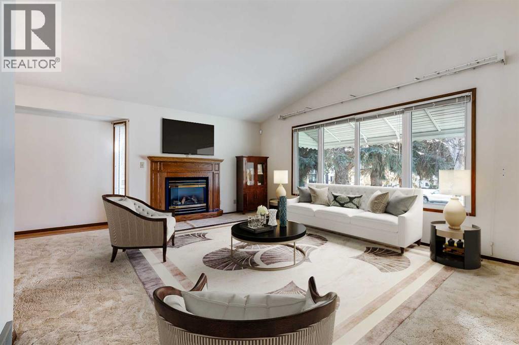 3387 Breton Close Nw, Calgary, AB - Indoor Photo Showing Living Room With Fireplace