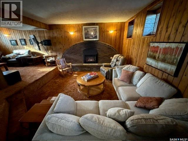 10 Dragan Crescent, Saskatoon, SK - Indoor Photo Showing Living Room With Fireplace
