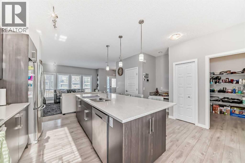 57 Cornerstone Manor N, Calgary, AB - Indoor Photo Showing Kitchen With Double Sink With Upgraded Kitchen