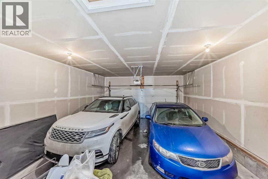 57 Cornerstone Manor N, Calgary, AB - Indoor Photo Showing Garage