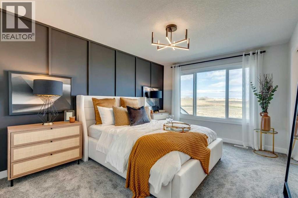 149 Southbow Drive, Cochrane, AB - Indoor Photo Showing Bedroom