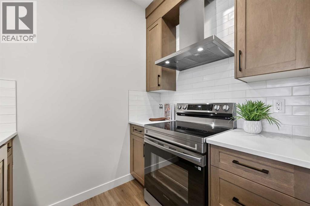 1051 Bayview Crescent, Airdrie, AB - Indoor Photo Showing Kitchen