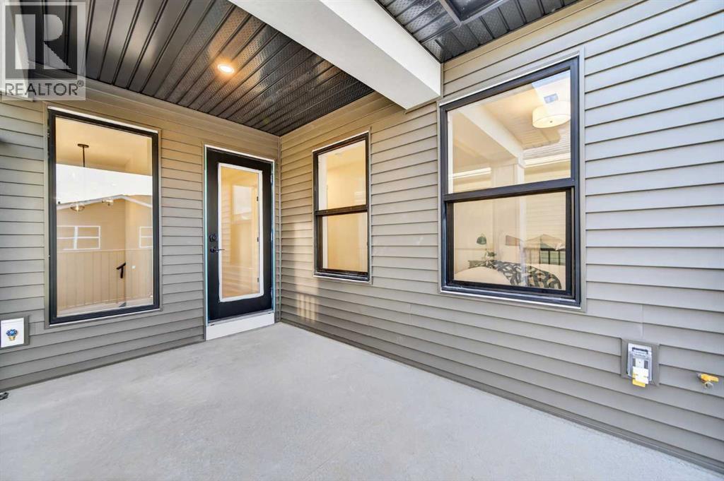 1051 Bayview Crescent, Airdrie, AB - Outdoor With Deck Patio Veranda With Exterior