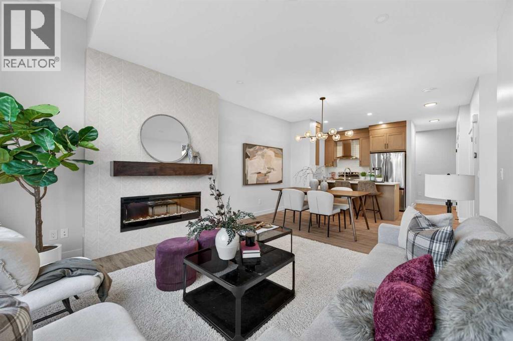 1051 Bayview Crescent, Airdrie, AB - Indoor Photo Showing Living Room With Fireplace