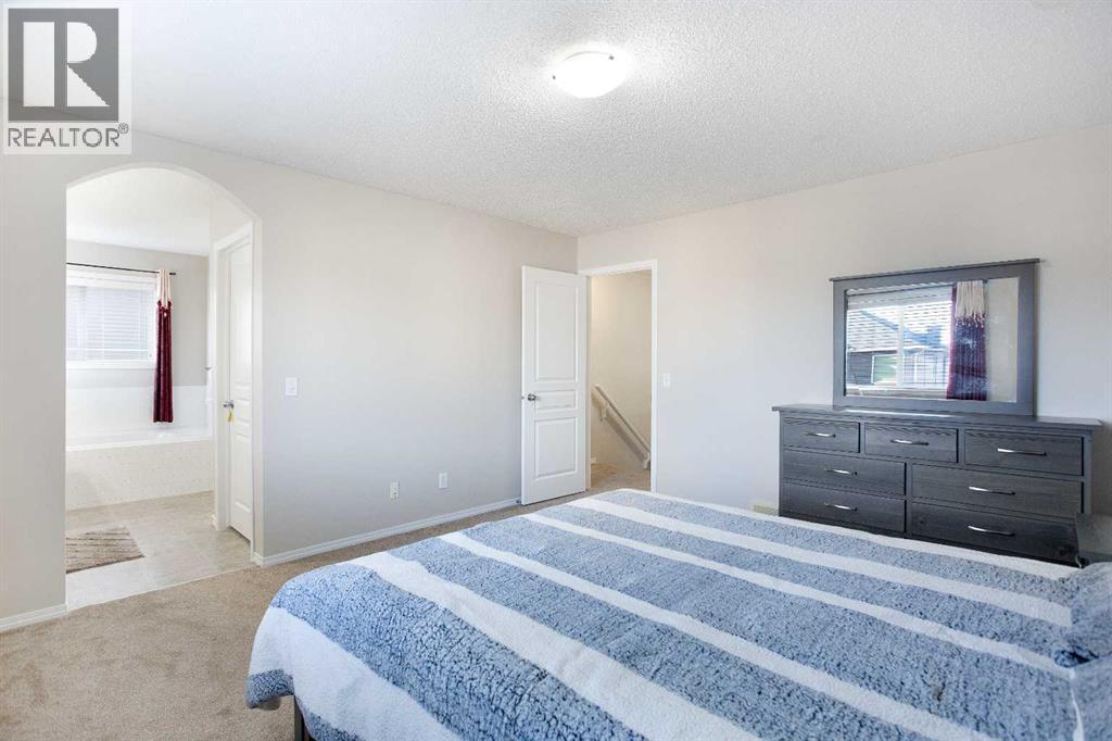 138 Saddlecrest Way Ne, Calgary, AB - Indoor Photo Showing Bedroom