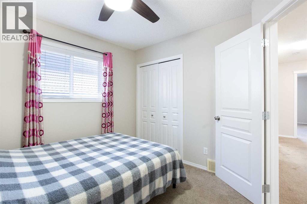 138 Saddlecrest Way Ne, Calgary, AB - Indoor Photo Showing Bedroom