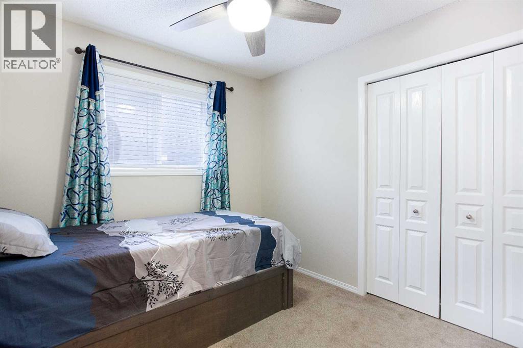 138 Saddlecrest Way Ne, Calgary, AB - Indoor Photo Showing Bedroom
