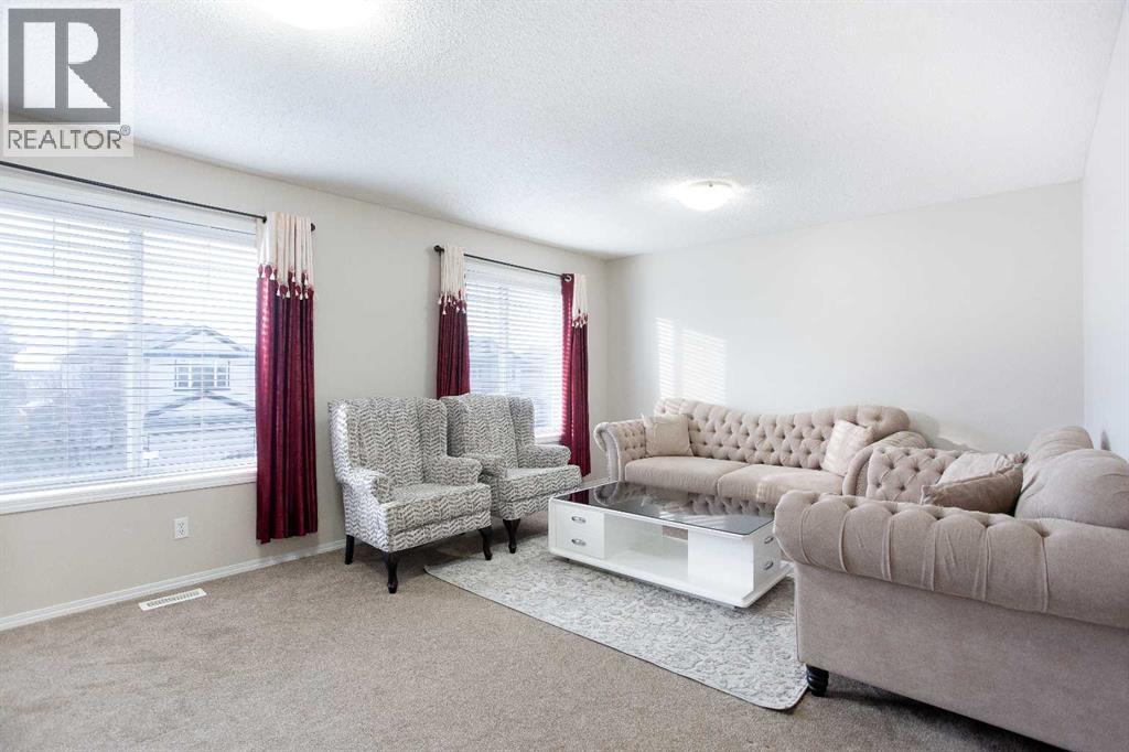 138 Saddlecrest Way Ne, Calgary, AB - Indoor Photo Showing Living Room