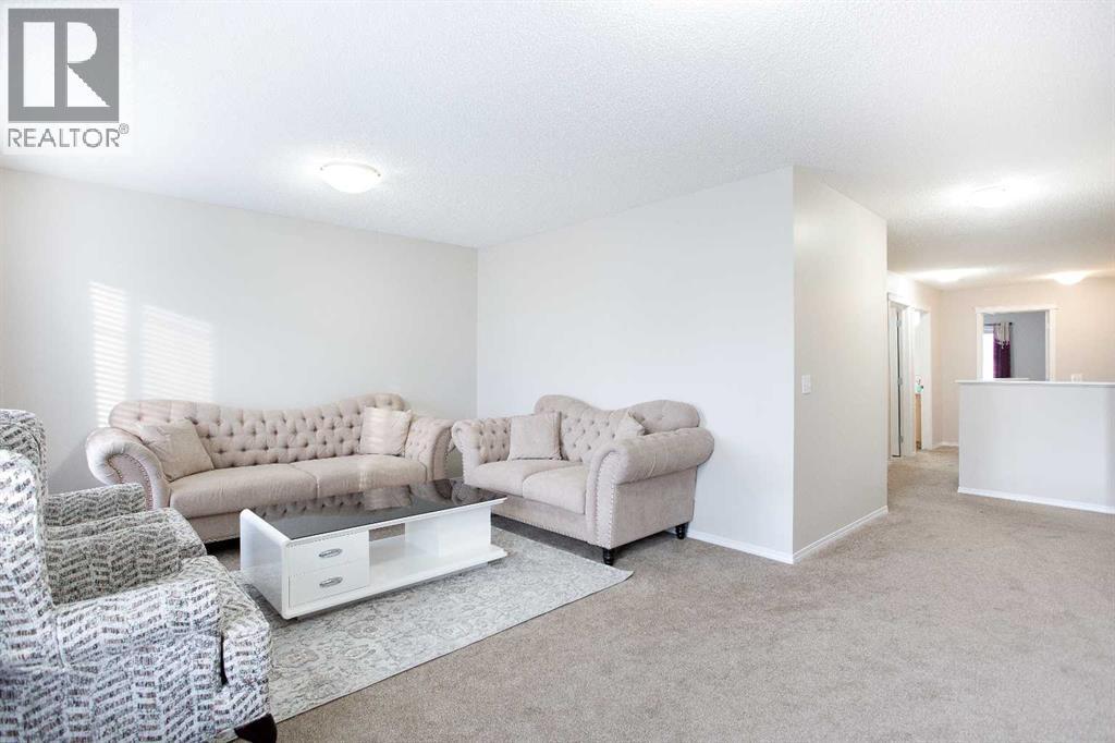 138 Saddlecrest Way Ne, Calgary, AB - Indoor Photo Showing Living Room