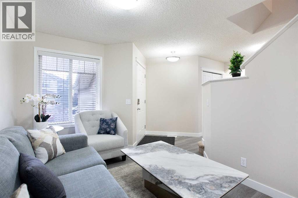 138 Saddlecrest Way Ne, Calgary, AB - Indoor Photo Showing Living Room