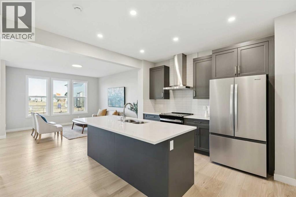 438 South Shore Drive, Chestermere, AB - Indoor Photo Showing Kitchen With Double Sink With Upgraded Kitchen