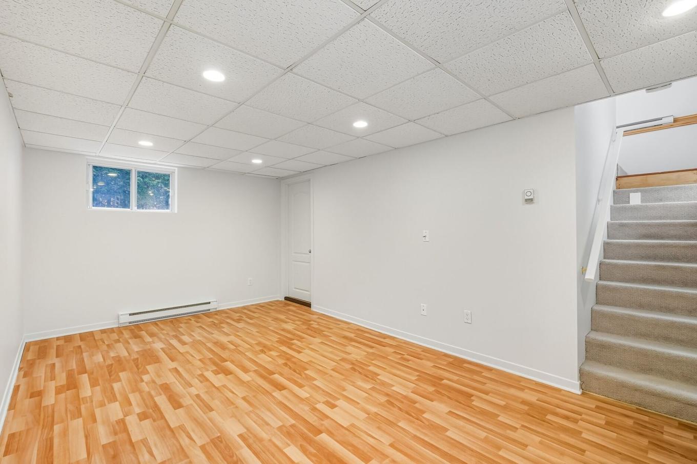 Family room - 5710 Rue Anthony, Brossard, QC - Indoor Photo Showing Other Room