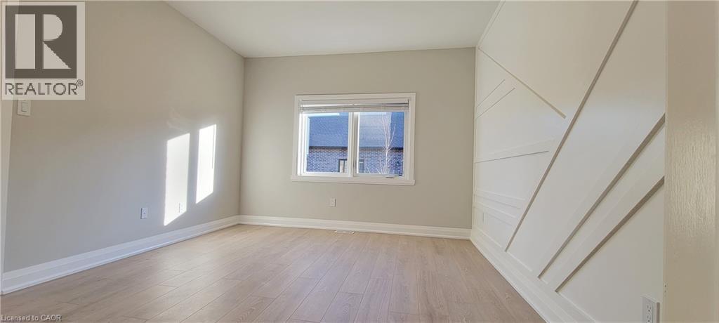 floors and baseboards - 24 Tamarack Way, Simcoe, ON - Indoor Photo Showing Other Room