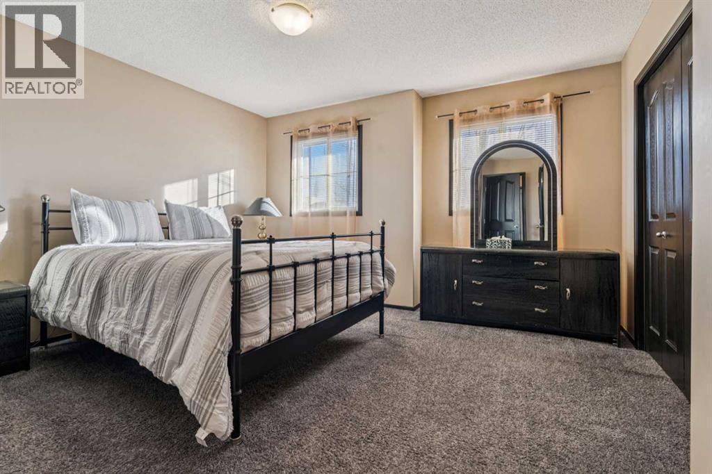 110 Eversyde Common Sw, Calgary, AB - Indoor Photo Showing Bedroom