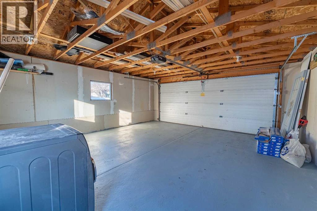 134 Erin Meadow Crescent Se, Calgary, AB - Indoor Photo Showing Garage