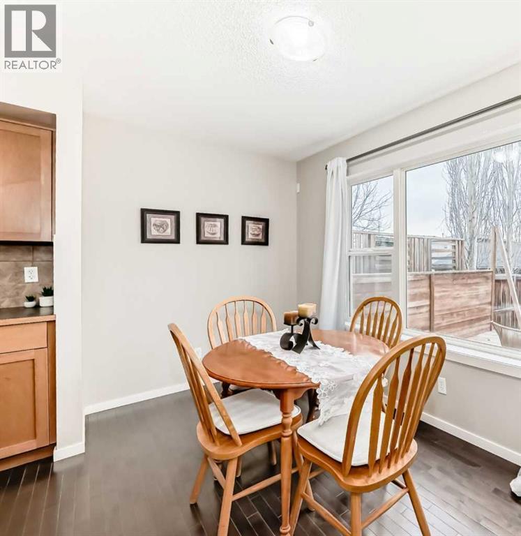 822 Panatella Boulevard Nw, Calgary, AB - Indoor Photo Showing Dining Room