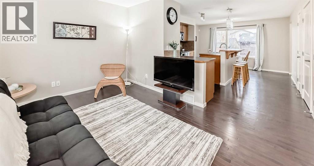 822 Panatella Boulevard Nw, Calgary, AB - Indoor Photo Showing Living Room