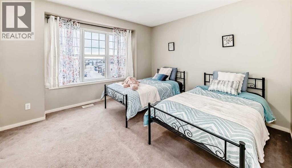 Master bedroom - 822 Panatella Boulevard Nw, Calgary, AB - Indoor Photo Showing Bedroom