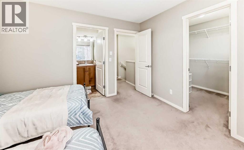 822 Panatella Boulevard Nw, Calgary, AB - Indoor Photo Showing Bedroom