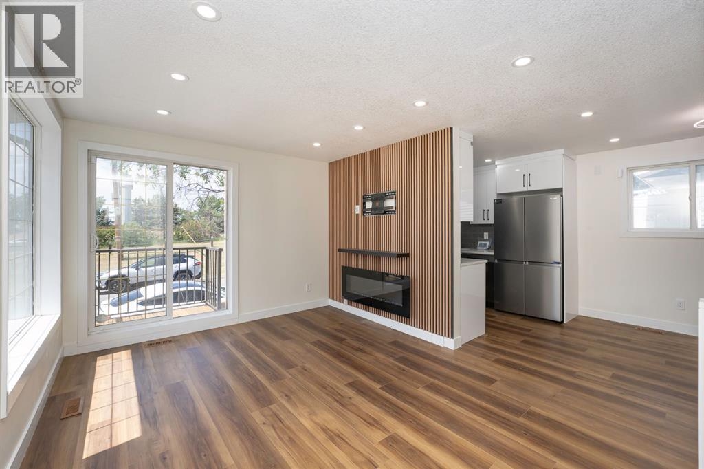 140 Whitworth Way, Calgary, AB - Indoor With Fireplace