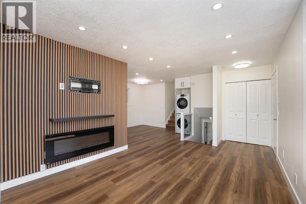 140 Whitworth Way, Calgary, AB - Indoor With Fireplace