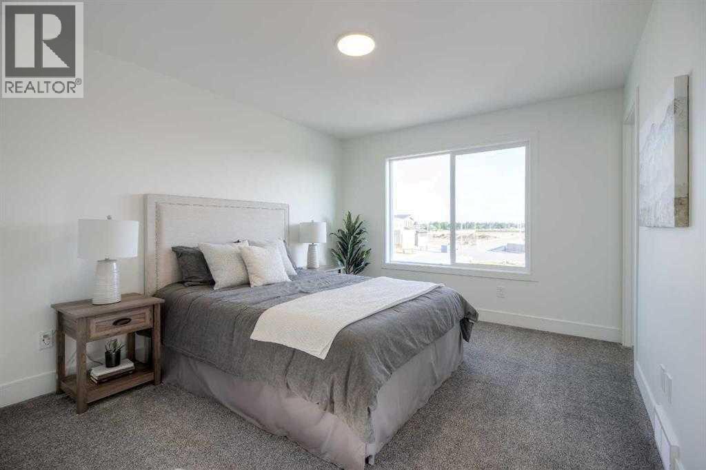 4329 28 Avenue S, Lethbridge, AB - Indoor Photo Showing Bedroom
