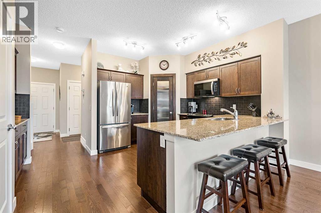 56, 351 Monteith Drive Se, High River, AB - Indoor Photo Showing Kitchen With Upgraded Kitchen