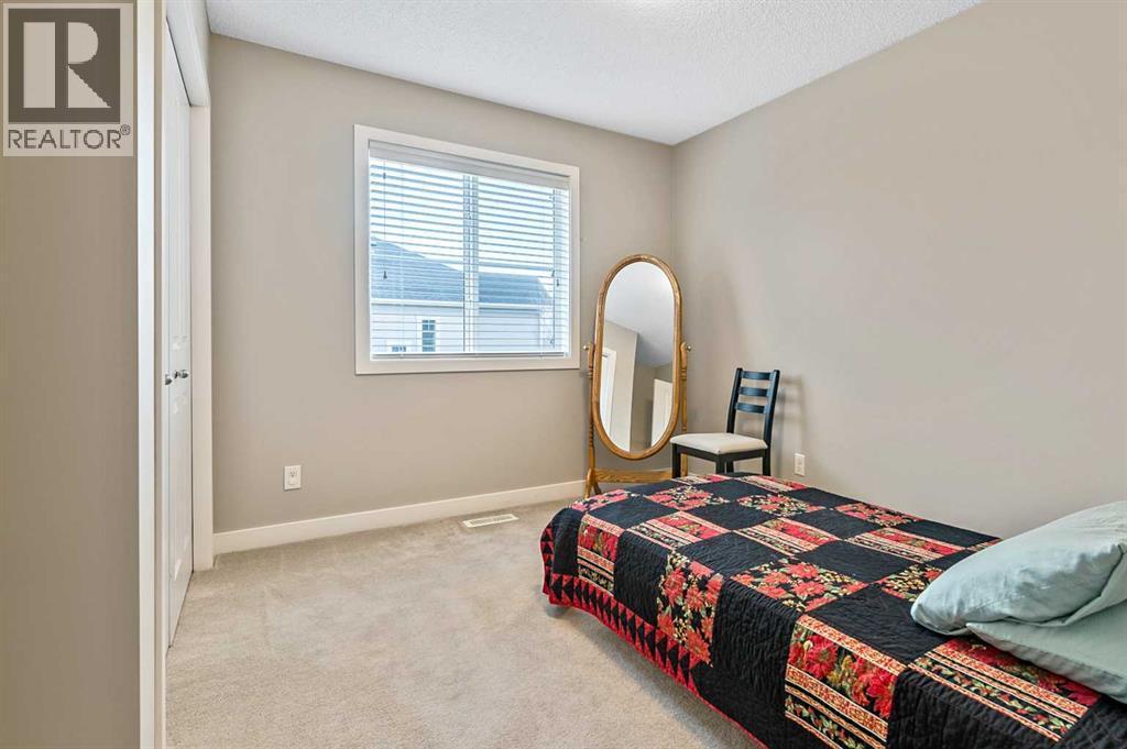 56, 351 Monteith Drive Se, High River, AB - Indoor Photo Showing Bedroom