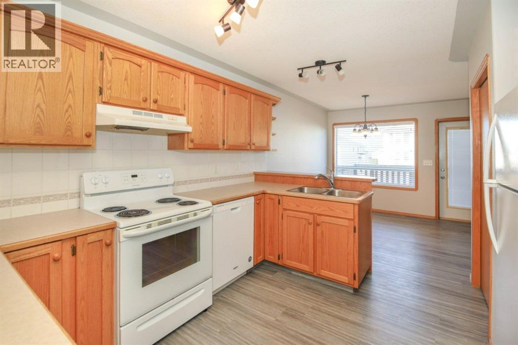 33 Duckering Close, Red Deer, AB - Indoor Photo Showing Kitchen With Double Sink